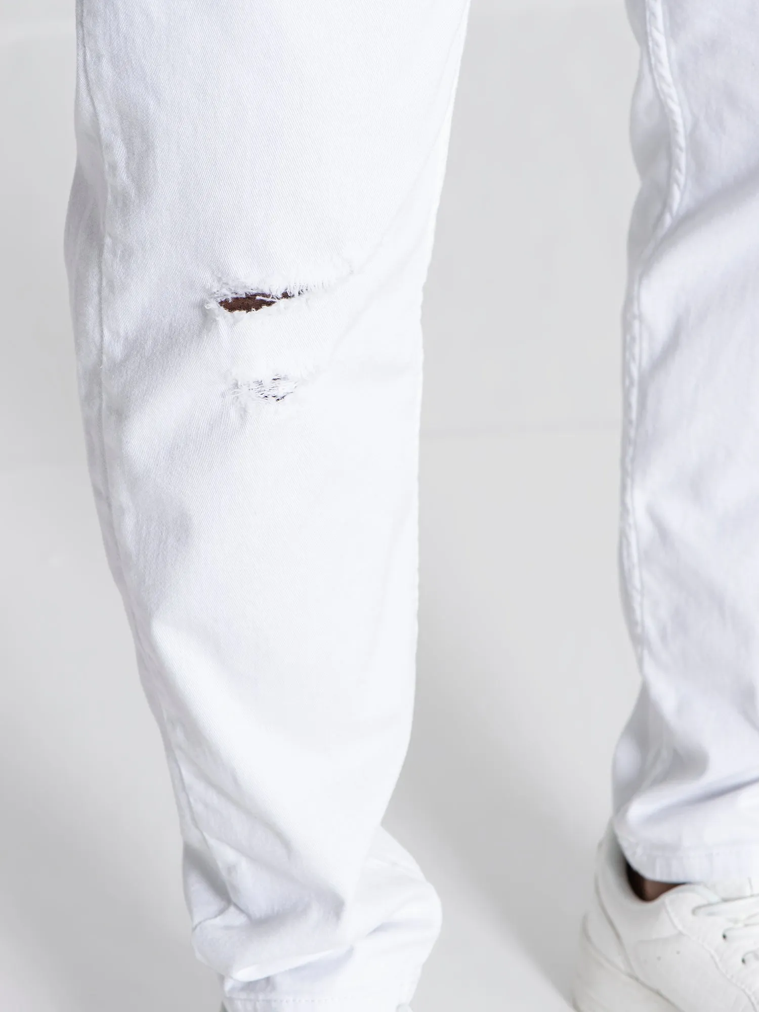 White GK Ripped Carrot Jeans